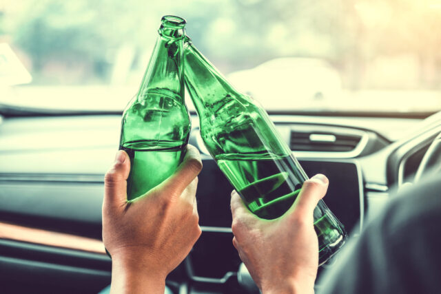 driver and passenger drinking open container