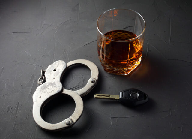 DUI handcuffs drink keys drunk driving DWI