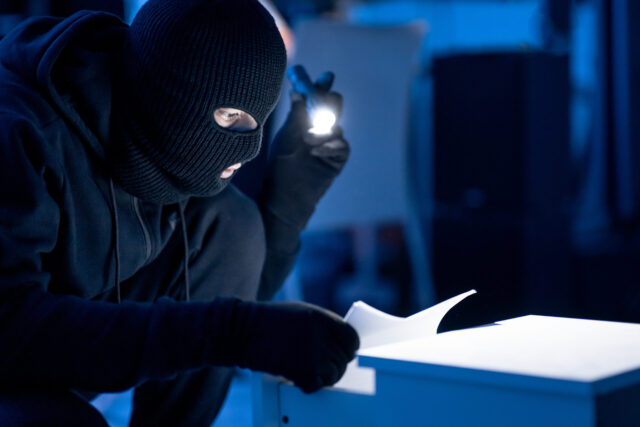 intruder looking at files