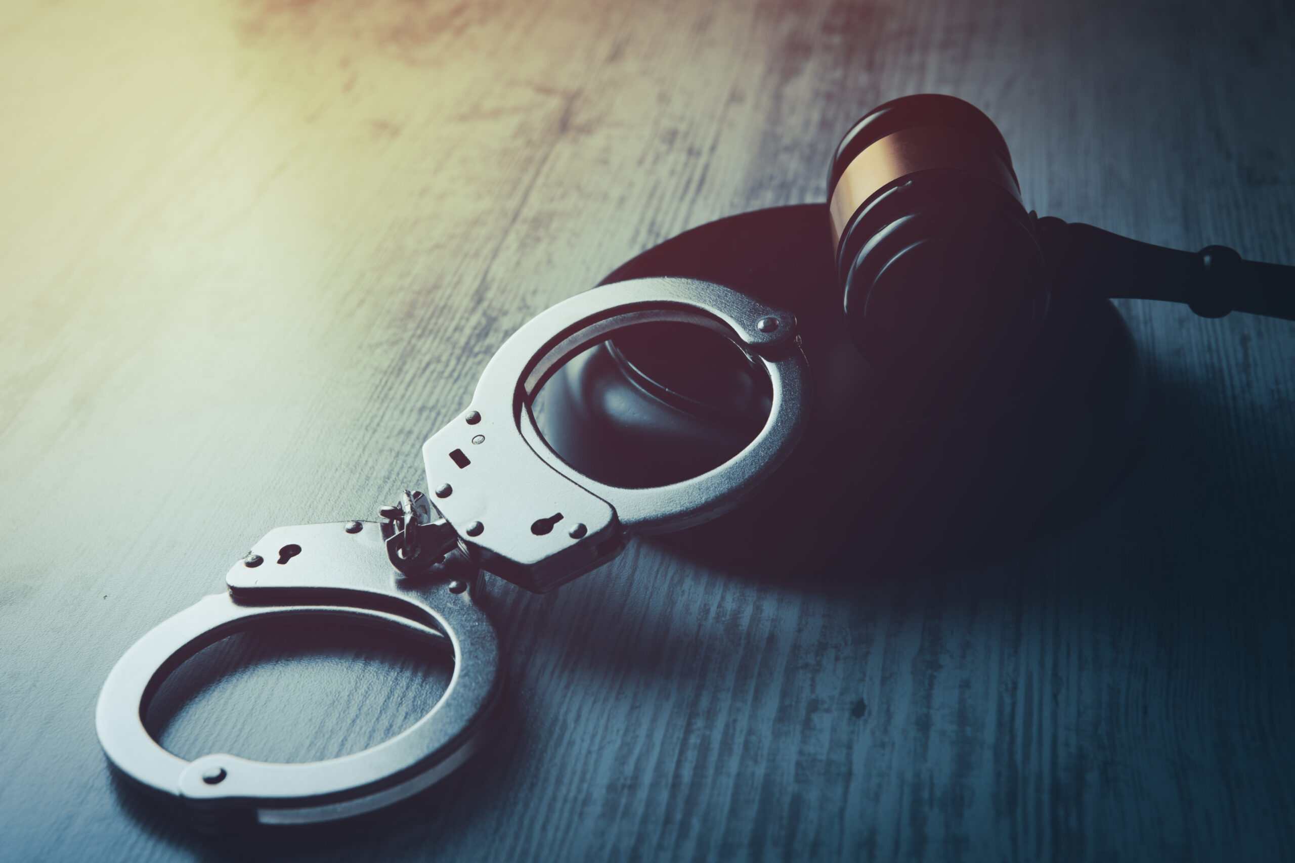 Legal law concept image - gavel and handcuffs